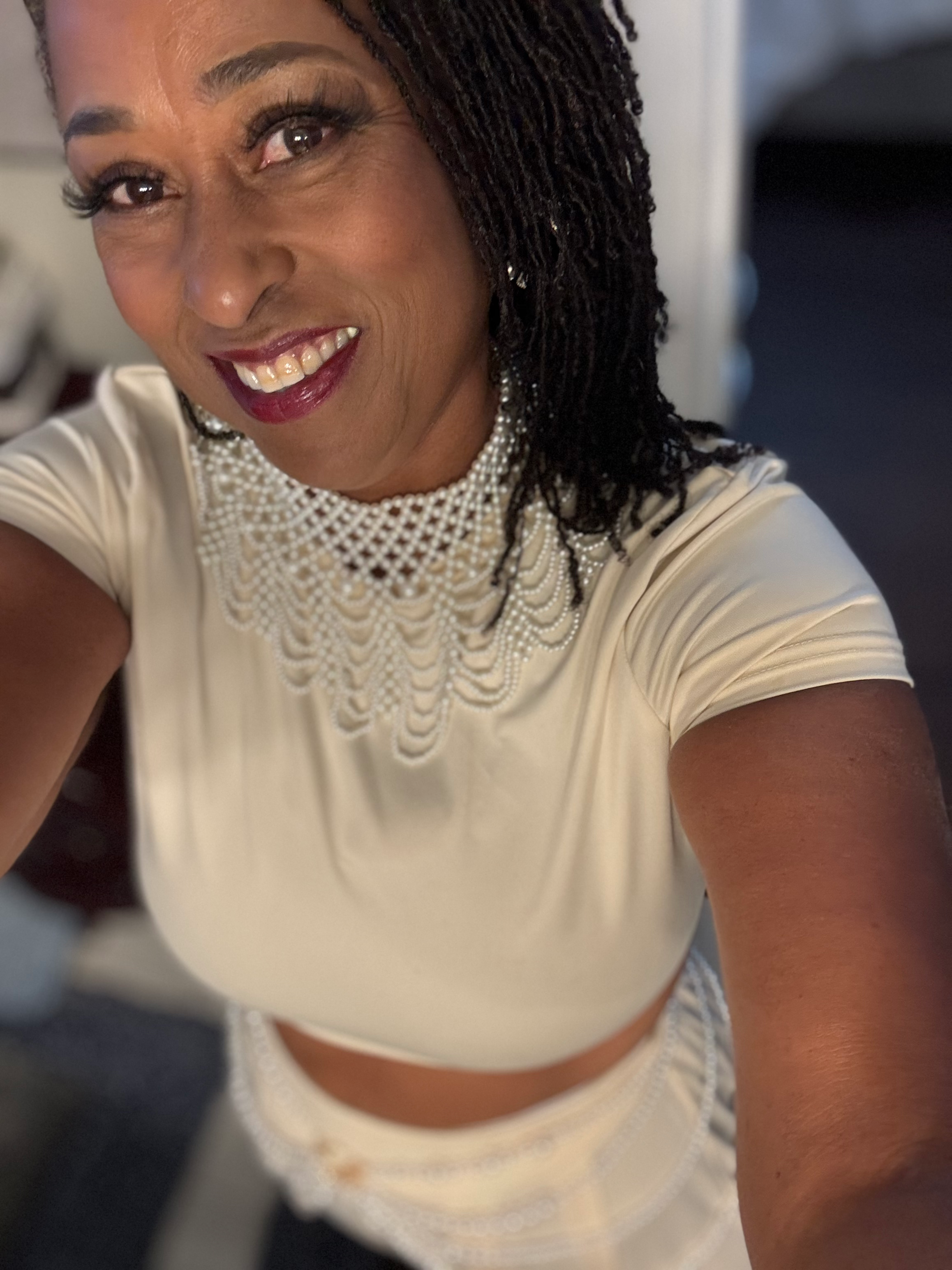 Tammy Smith smiling in an elegant portrait